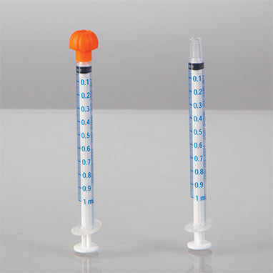 Oral Dispensers with Tip Caps
