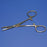 Sklar - Needle Holder 4-3/4 Inch Length Straight Serrated Tip Finger Ring Handle - 20-2747