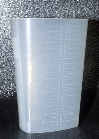 Care Line - Graduated Container Triangular Polypropylene 1,000 mL (32 oz.) - 06610005