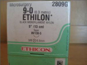 J & J Healthcare Systems Ethilon Suture with Needle Nonabsorbable Uncoated Black Suture Monofilament Nylon Size 9-0 6 Inch Suture 1-Needle 6.5 mm Length 3/8 Circle Taper Point Needle - 2809G