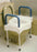 Alimed Raised Toilet Seat with Arms 4 Inch Height White 300 lbs. Weight Capacity - 8749