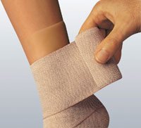 Comprilan - Compression Bandage 4 Inch X 11 Yard Standard Compression Clip Detached Closure Tan NonSterile - 77188